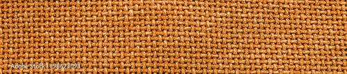Φωτογραφία Orange woven material / textile background texture - panorama.