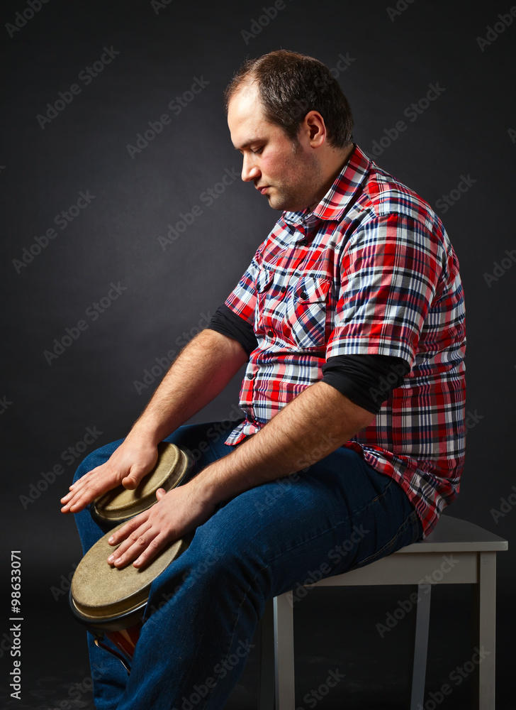 portrait of musician with bongo portrait of musician with bongo