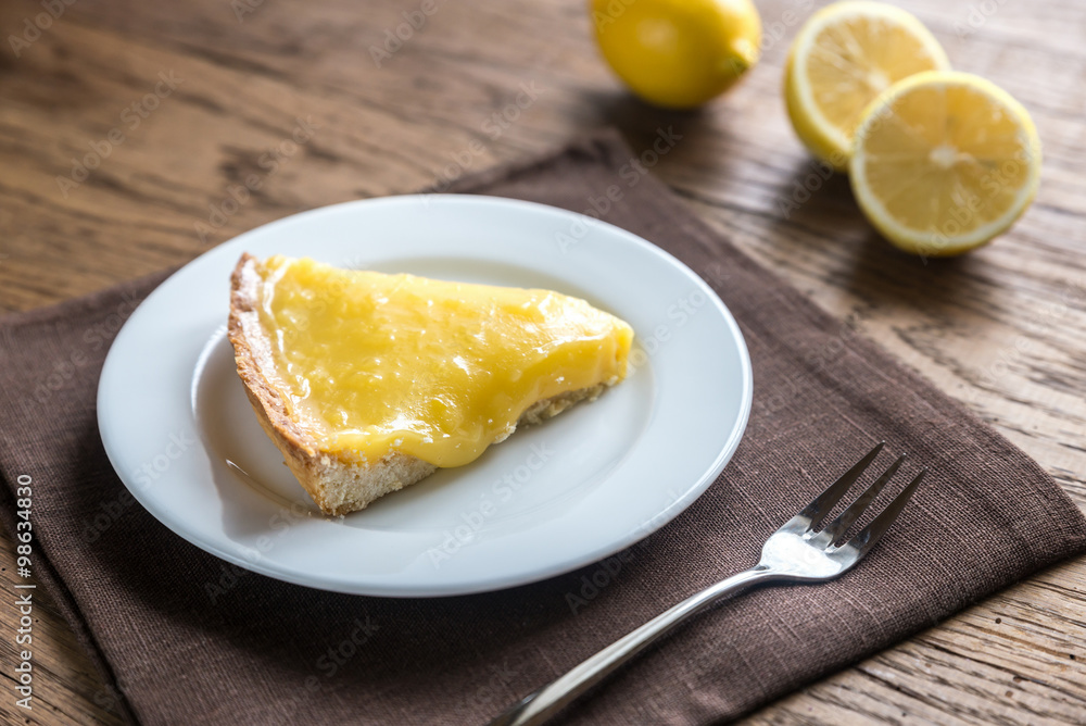 Slice of lemon tart on the plate Slice of lemon tart on the plate