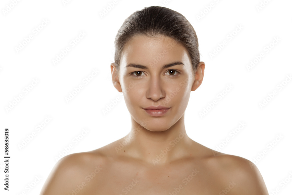 beautiful young woman with only base on her face beautiful young woman with only base on her face