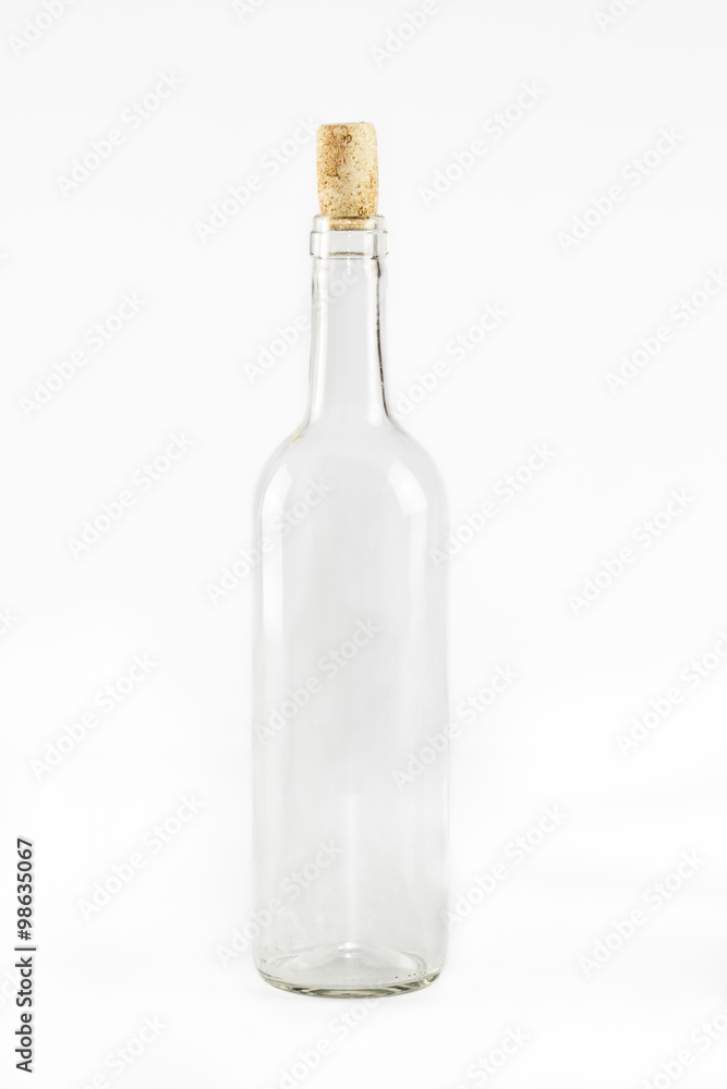 Empty glass bottle with cork isolated on white background
