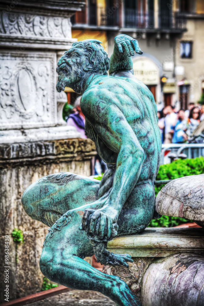 satyr bronze statue in Neptune fountain in Florence