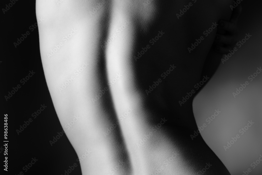 Beautiful and naked female back view