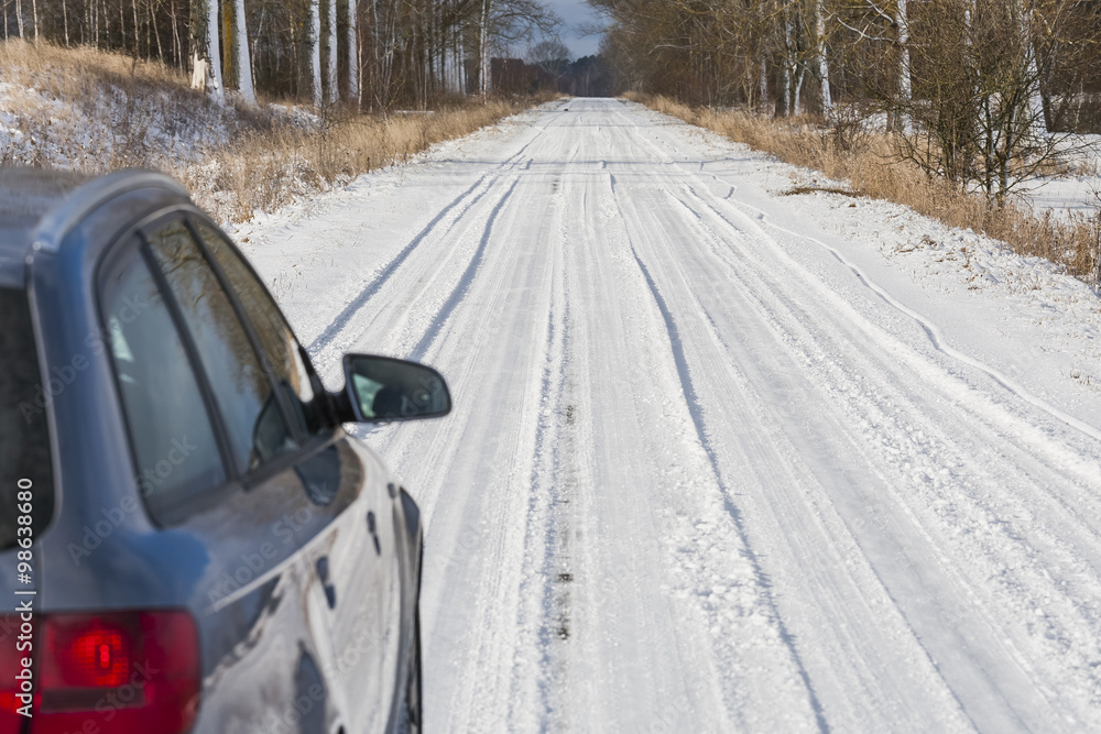 Car on a dangerous road, covered with snow and ice. Car on a dangerous road, covered with snow and ice.