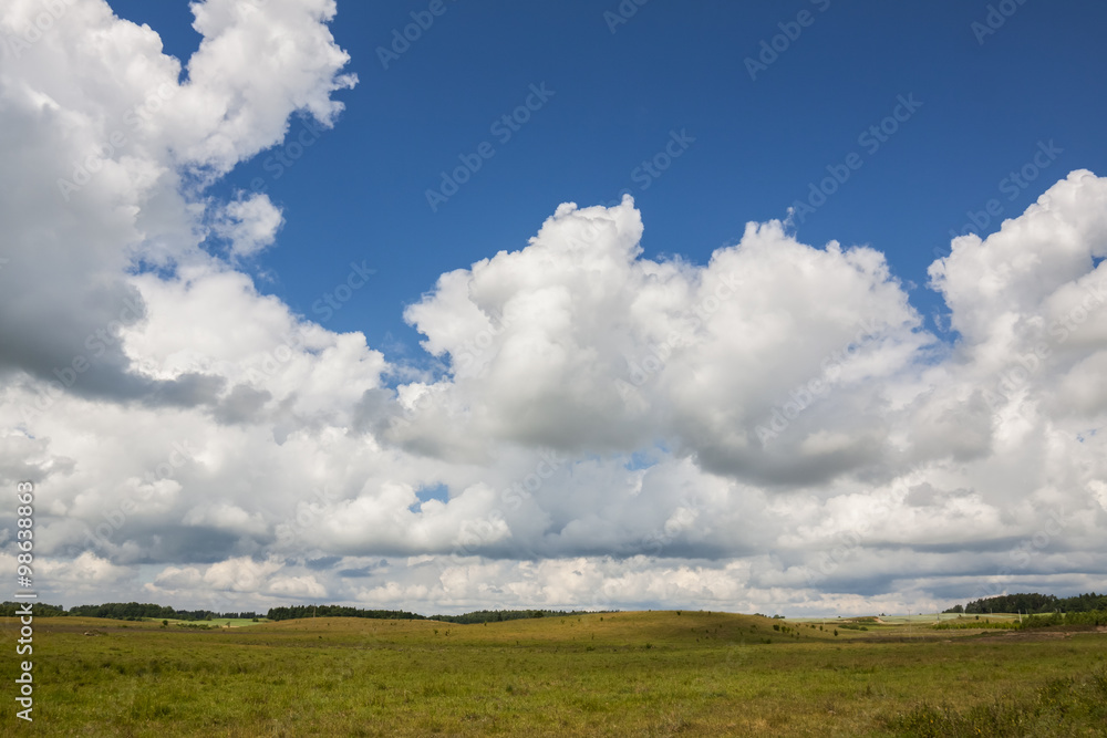 Agricultural landscape, blue sky on the horizon, beautiful weather. Agricultural landscape, blue sky on the horizon, beautiful weather.