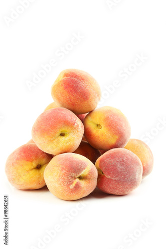 Fresh peaches fruit isolated on a white