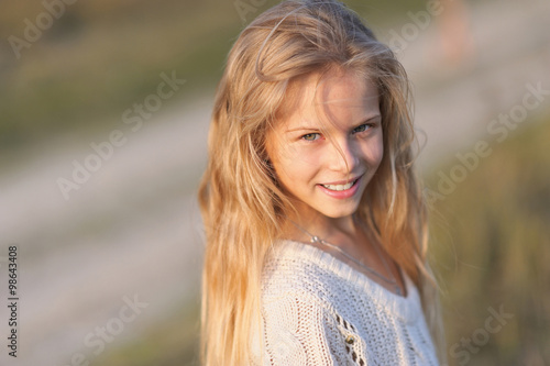 portrait of little girl outdoors in autumn