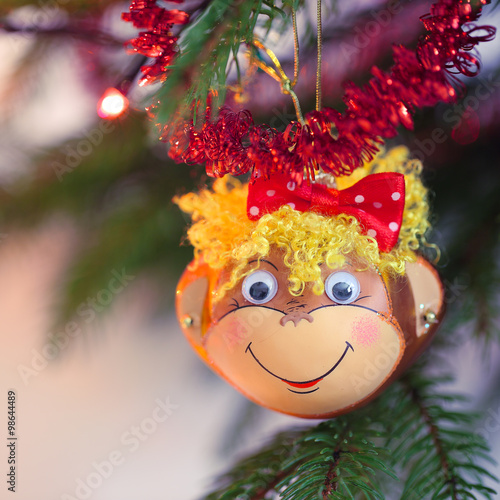 Fototapeta Naklejka Na Ścianę i Meble -  Smiling monkey christmas decoration