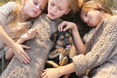 Portrait of three girlfriends on the nature