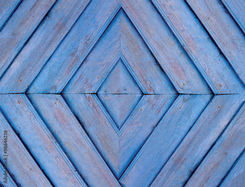 symmetrical background of the wooden planks on the wall. rhombus pattern of wooden planks painted lilac paint - obrazy, fototapety, plakaty 