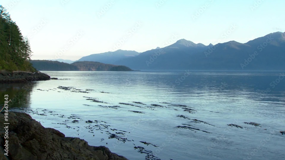 Landscape of the Johnstone Strait leading to a cove in British Columbia. Landscape of the Johnstone Strait leading to a cove in British Columbia.