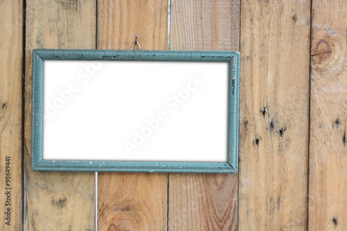 old vintage wooden photo frame on old wooden wall