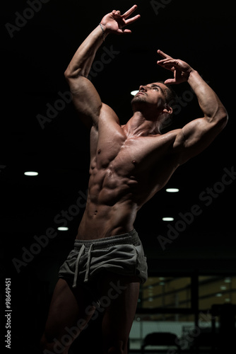 Strong Bodybuilding Man Looking Up © Jale Ibrak