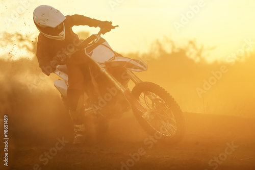 Silhouette motocross speed in track