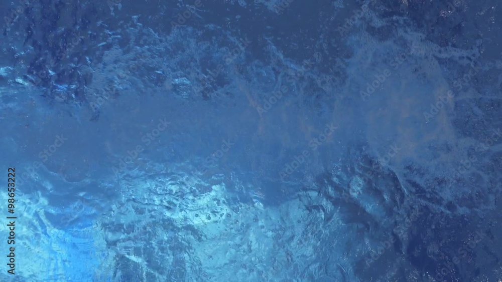 Swimmer diving into a pool while training. Swimmer diving into a pool while training.