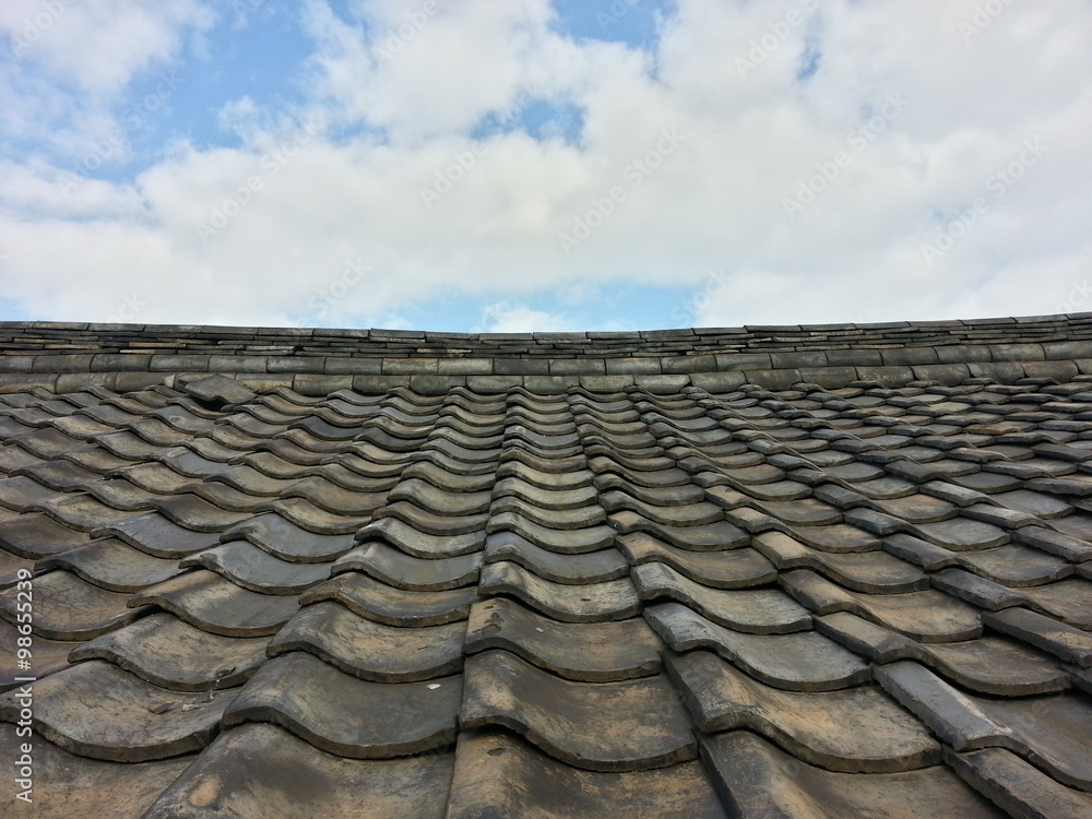 Fototapeta premium Old roof and the sky