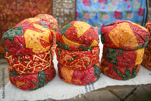 Colorful ethnic Rajasthan turbans on market at Jaisalmer fort, R