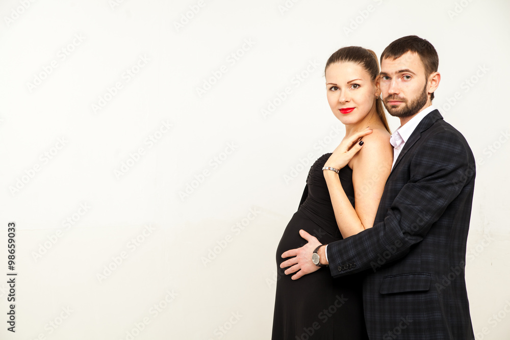 Young happy cheerful pregnant woman with husband together Young happy cheerful pregnant woman with husband together
