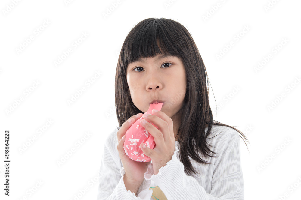 Little Girl inflate a Pink Balloon with Happy birthday message o Little Girl inflate a Pink Balloon with Happy birthday message o