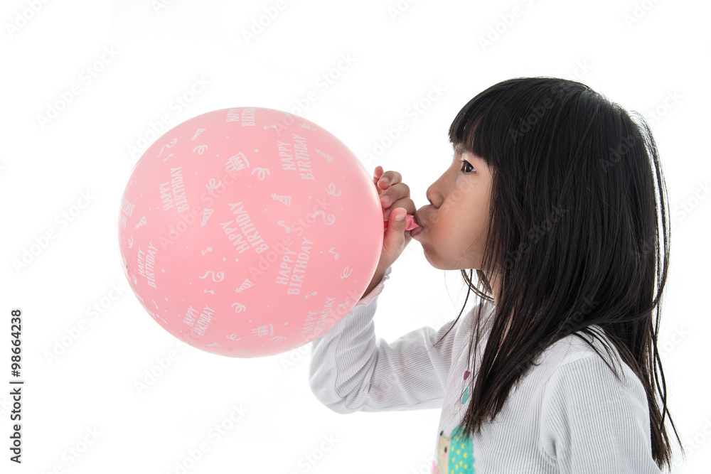 Little Girl inflate a Pink Balloon with Happy birthday message o Little Girl inflate a Pink Balloon with Happy birthday message o