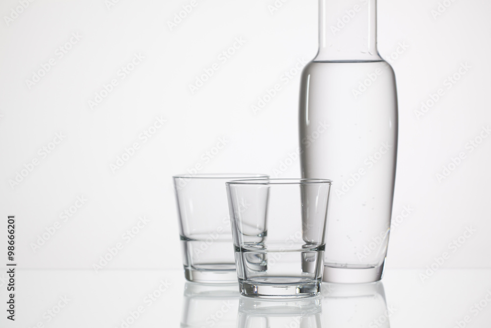 Glasses of water on the glass table Glasses of water on the glass table