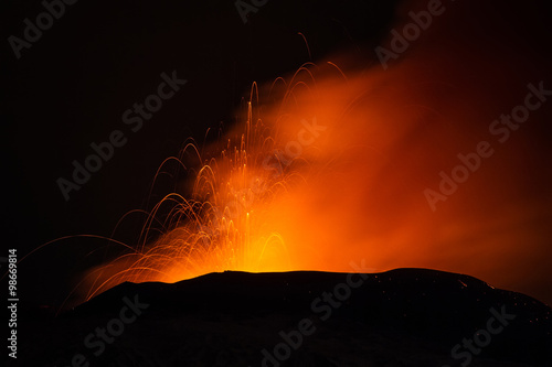 Volcano eruption. Mount Etna erupting from the crater Voragine 