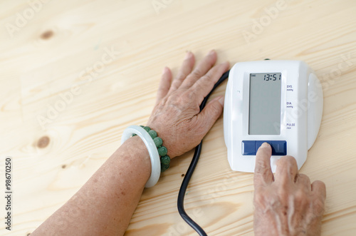 Checking blood pressure photo