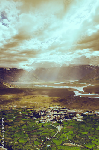 aerial view of ladakh landscape, green valley field on cloudy an © nuiiko