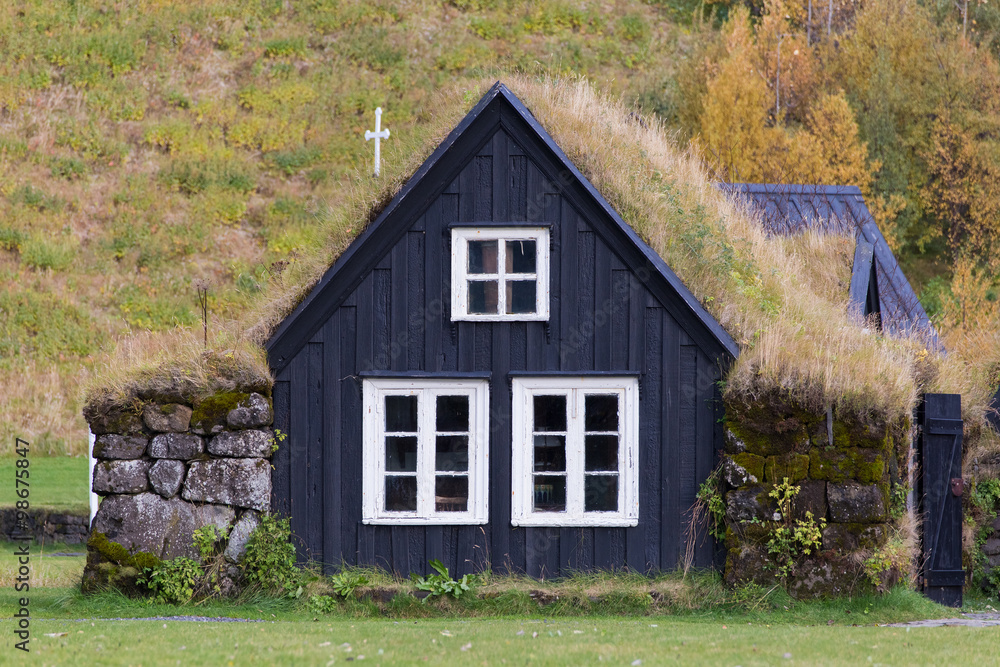 Fototapeta premium Traditional Icelandic House with grass roof. Skogar Folk Museum,