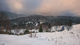 Wintertime landscape featuring snowy mountain