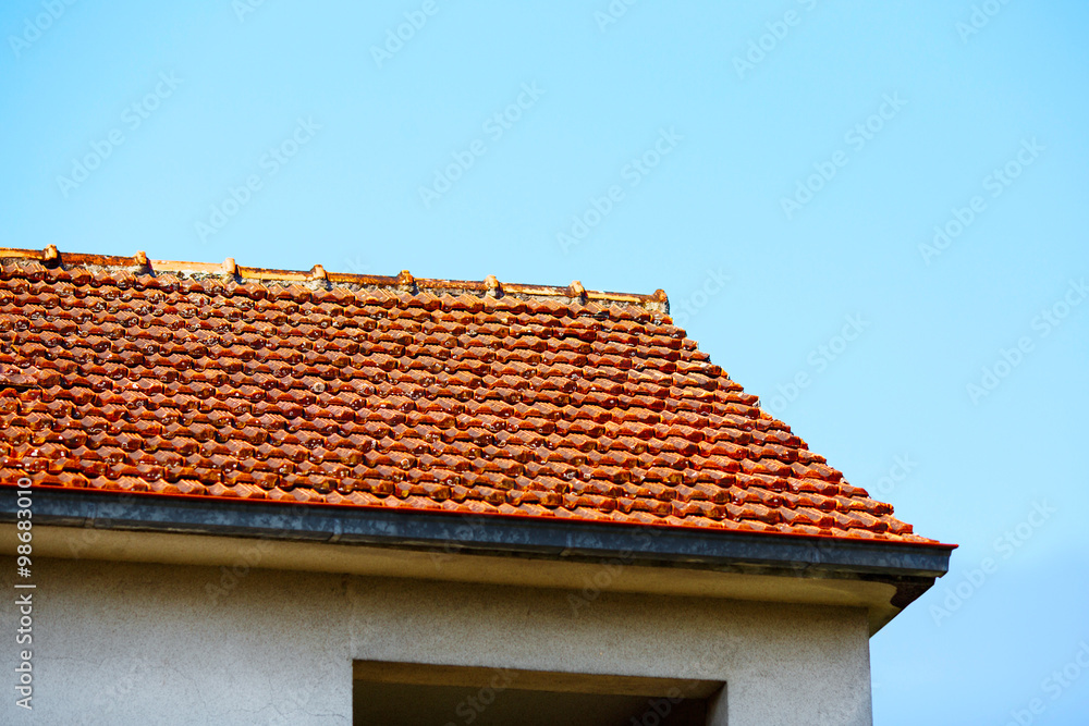 Red roof tiles and sky sunlight Red roof tiles and sky sunlight