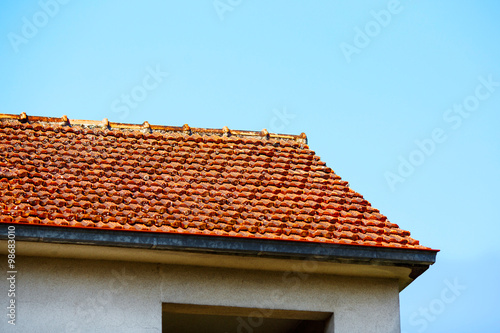 Red roof tiles and sky sunlight