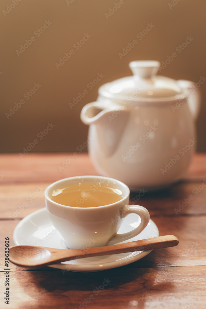 cup of tea on the wood desk cup of tea on the wood desk