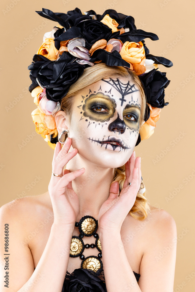 attractive young woman with sugar skull makeup,Dia de los Muertos - Mexican  Day of the dead woman wearing sugar skull makeup and flower wreath. Stock  Photo | Adobe Stock