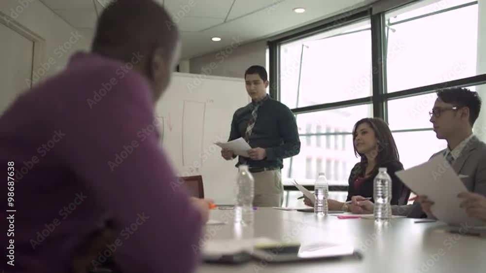 Group of attractive professionals involved in meeting Group of attractive professionals involved in meeting