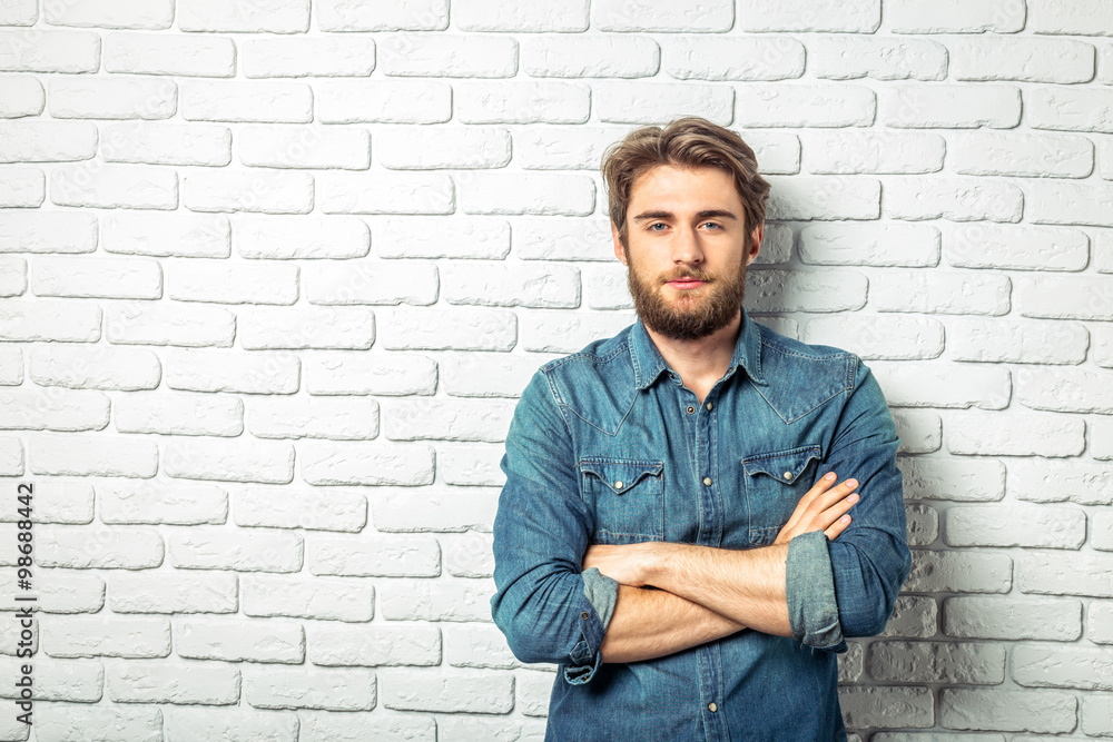 Portrait of a smiling man in a denim shirt Portrait of a smiling man in a denim shirt