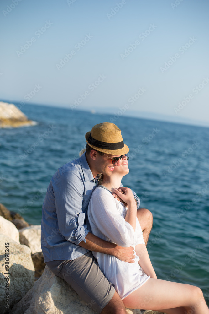 Smiling couple enjoying time together at the beach