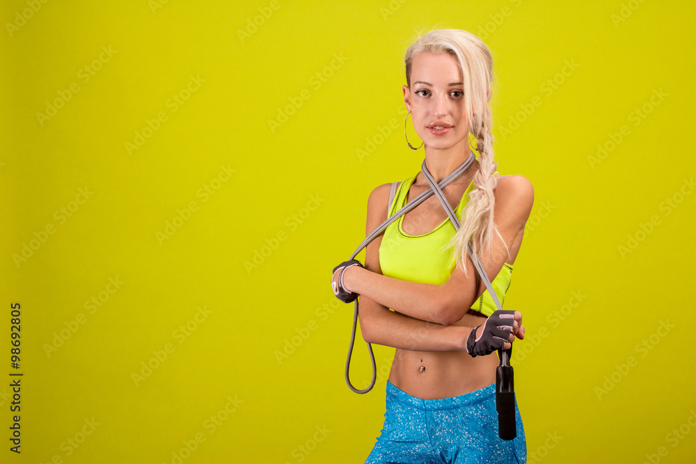 Portrait of young and healthy blonde with skipping rope Portrait of young and healthy blonde with skipping rope
