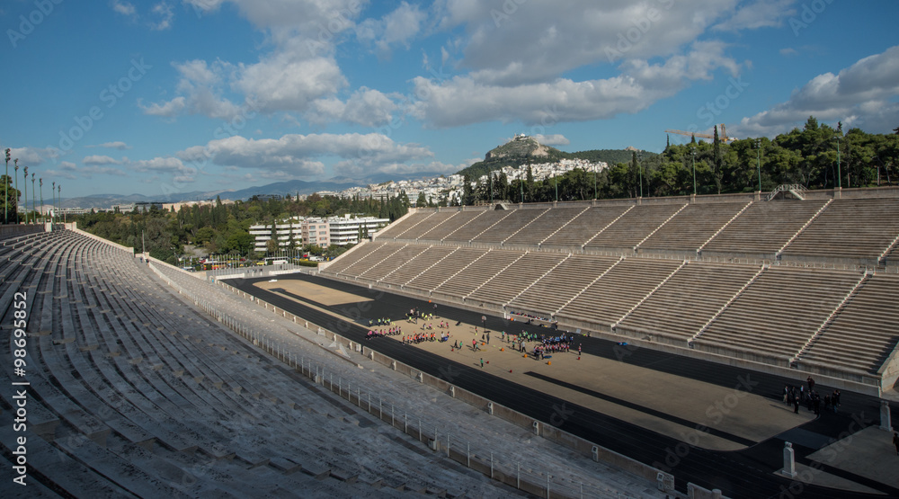 Panathenaic Stadium in Athens, Greece with Lycabettus Hill in the distance
