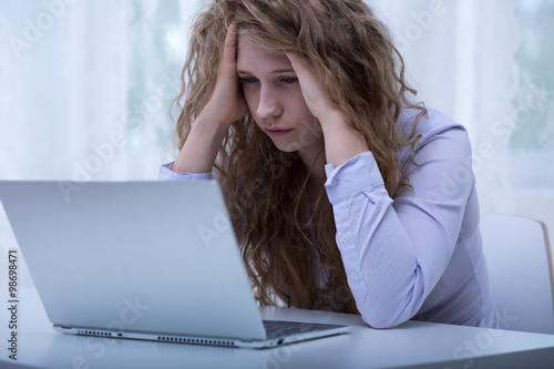 Fotografie Despair girl humiliated on internet