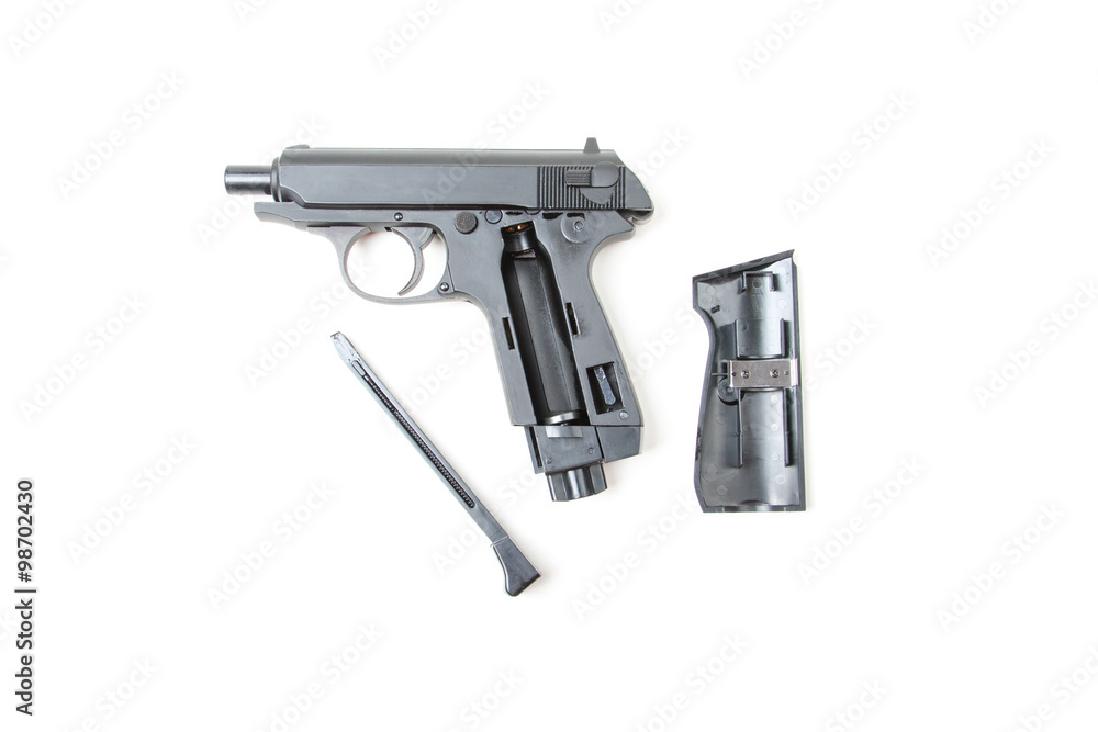 Disassembled gun, isolated