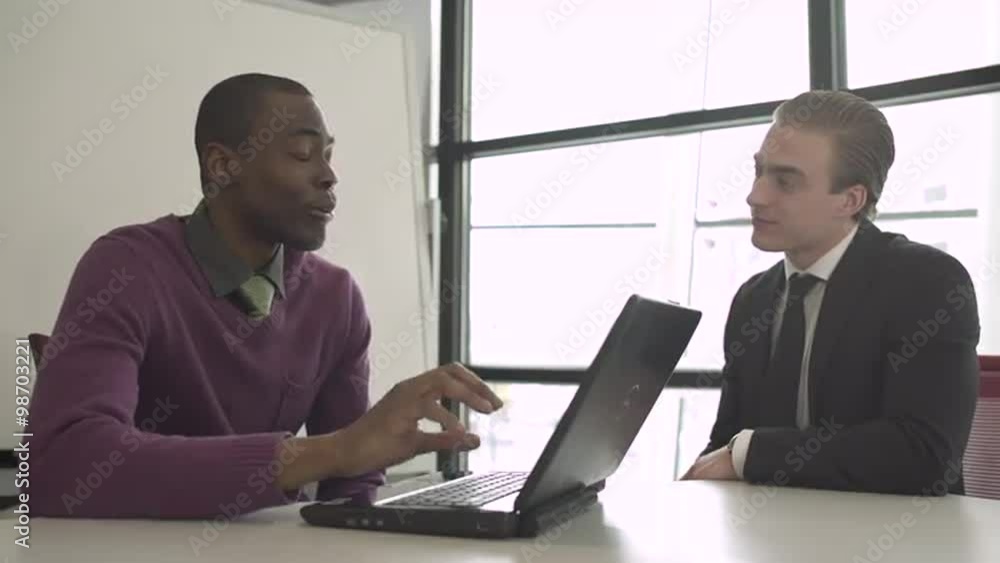 Group of attractive professionals involved in meeting Group of attractive professionals involved in meeting