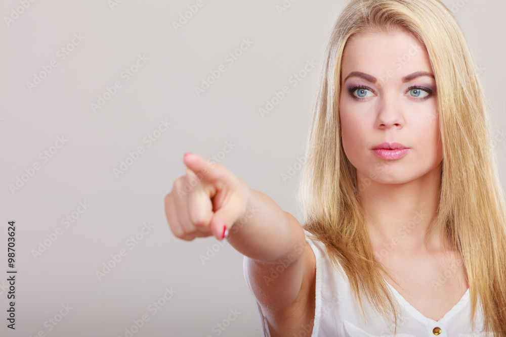 woman showing copy space pointing with finger woman showing copy space pointing with finger