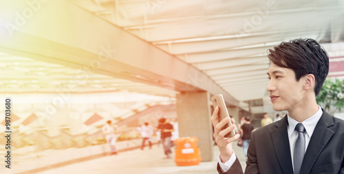 Photography Asian businessman using cellphone