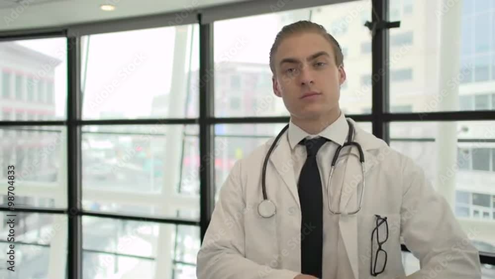 Attractive medical professional in doctors coat Attractive medical professional in doctors coat