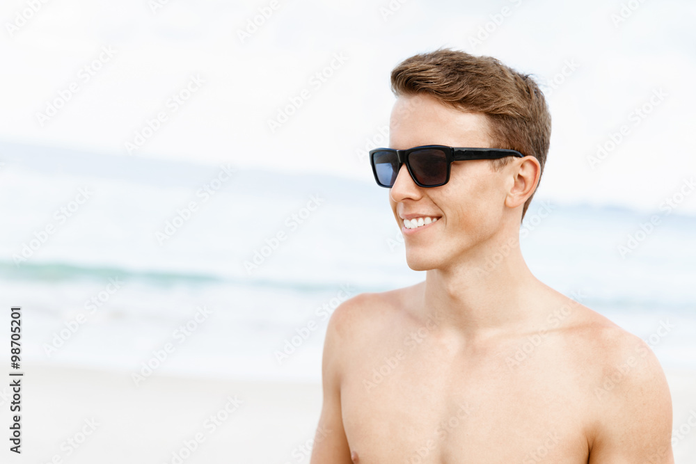 Handsome man posing at beach Handsome man posing at beach