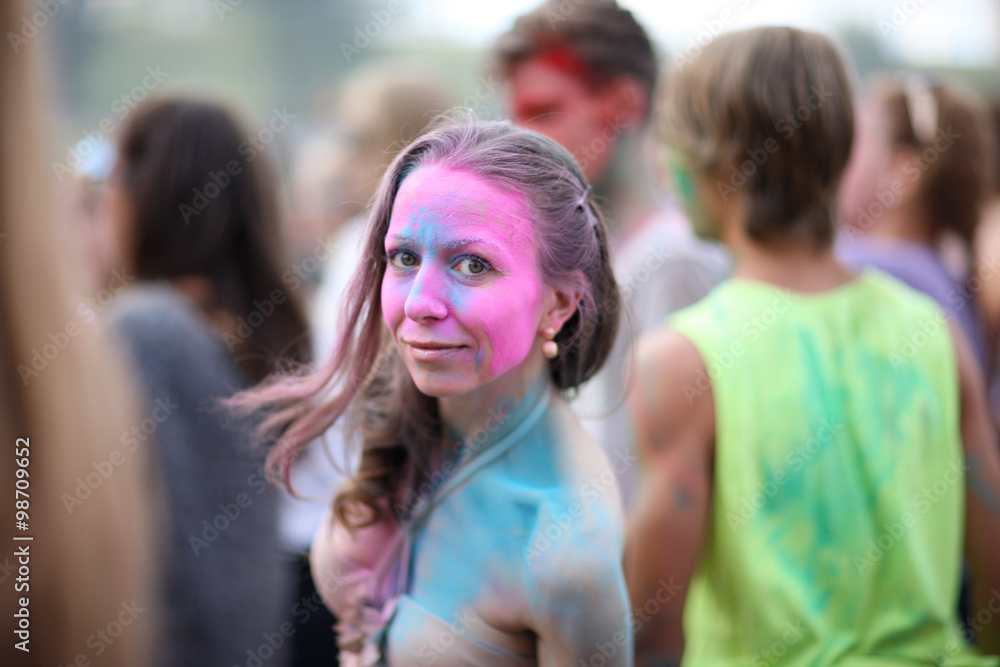 Beautiful cheerful lady having fun at Holi festival Beautiful cheerful lady having fun at Holi festival
