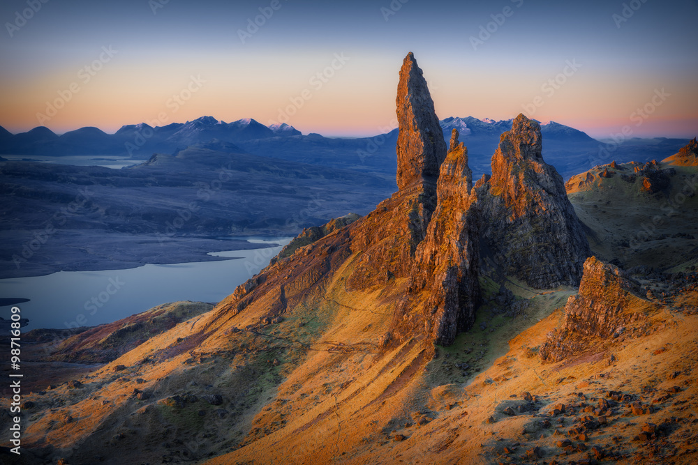 First light at sunrise over Old Man of Storr, Isle of Skye, Scotland, UK, on a cold morning