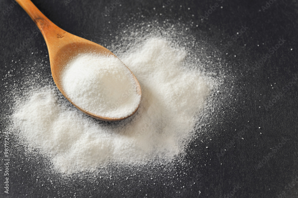 Bicarbonate in a wooden spoon