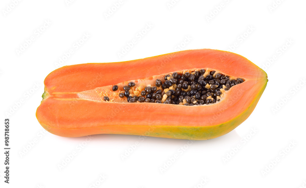 half cut rip papaya with seed on white background half cut rip papaya with seed on white background